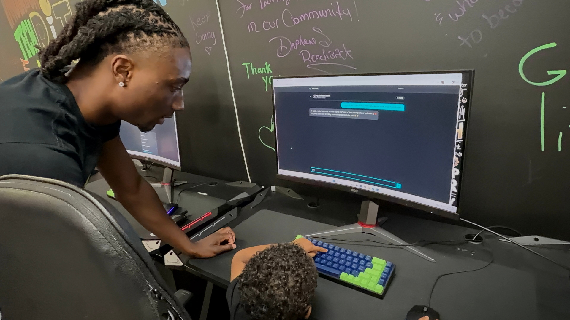 Scholars learning AI and coding at C3 Culture Code Camp
